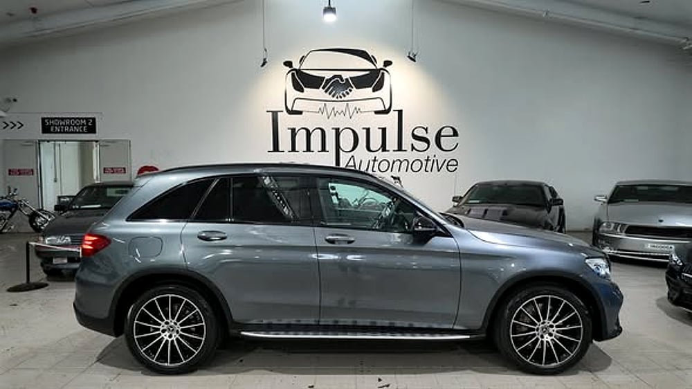 Side profile of a grey Mercedes-Benz SUV